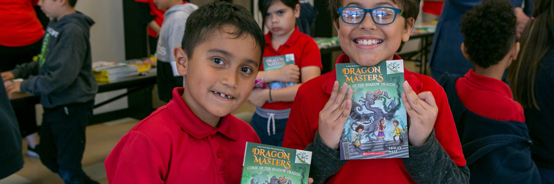 Two Smiling Kids with Books